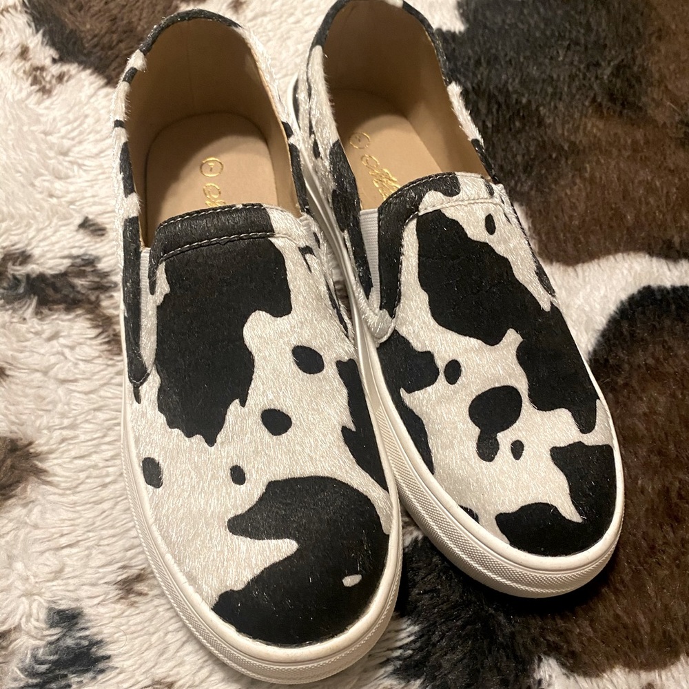 cow print slip on sneakers